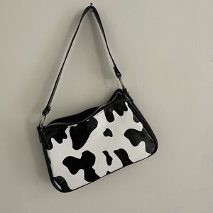 Cow print mini shoulder bag